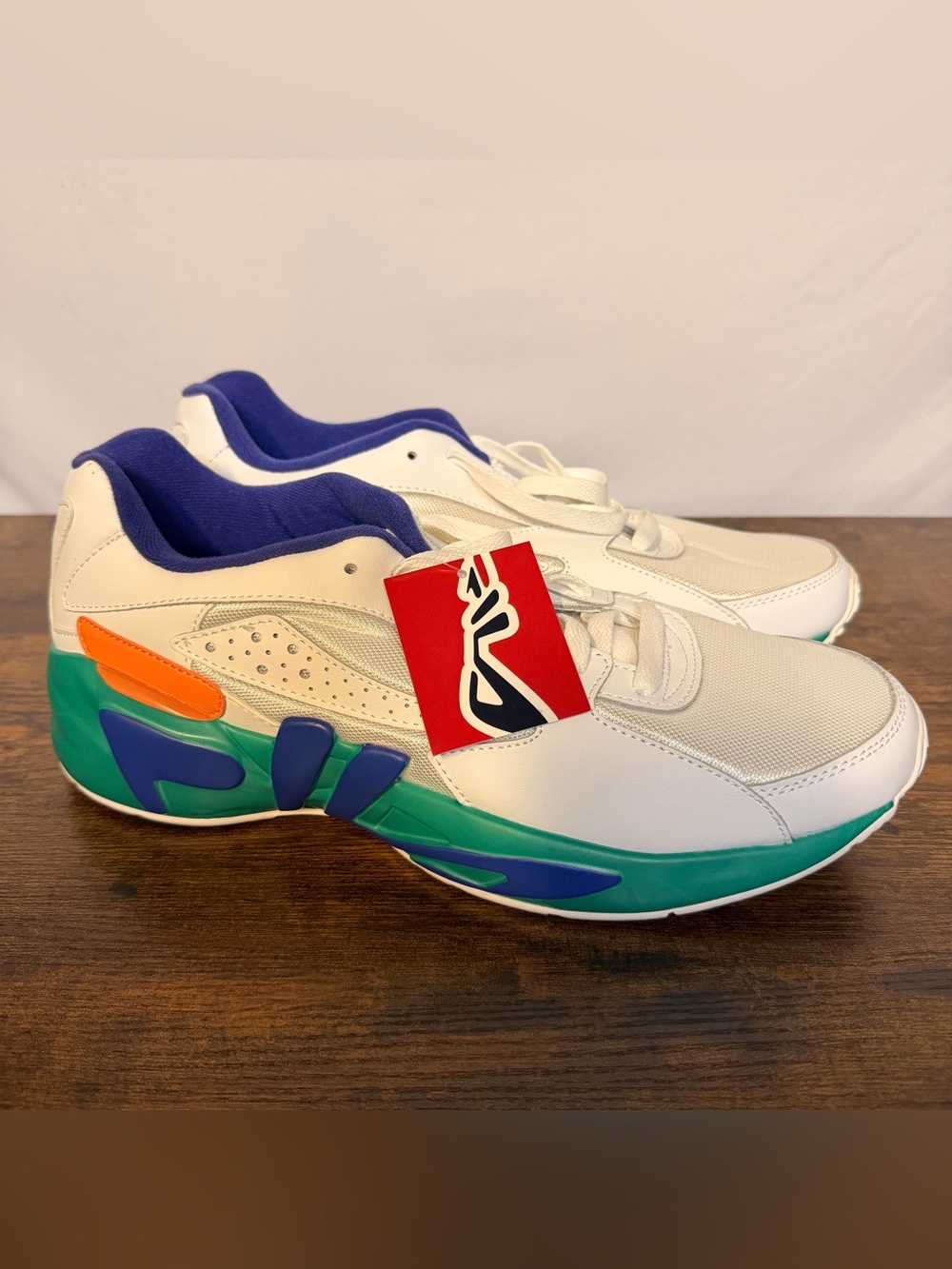 Fila White Athletic Sneakers with Blue, Green & Orange Accents